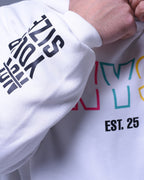 White oversized hoodie for unisex with bold black text on sleeve and colorful design on front